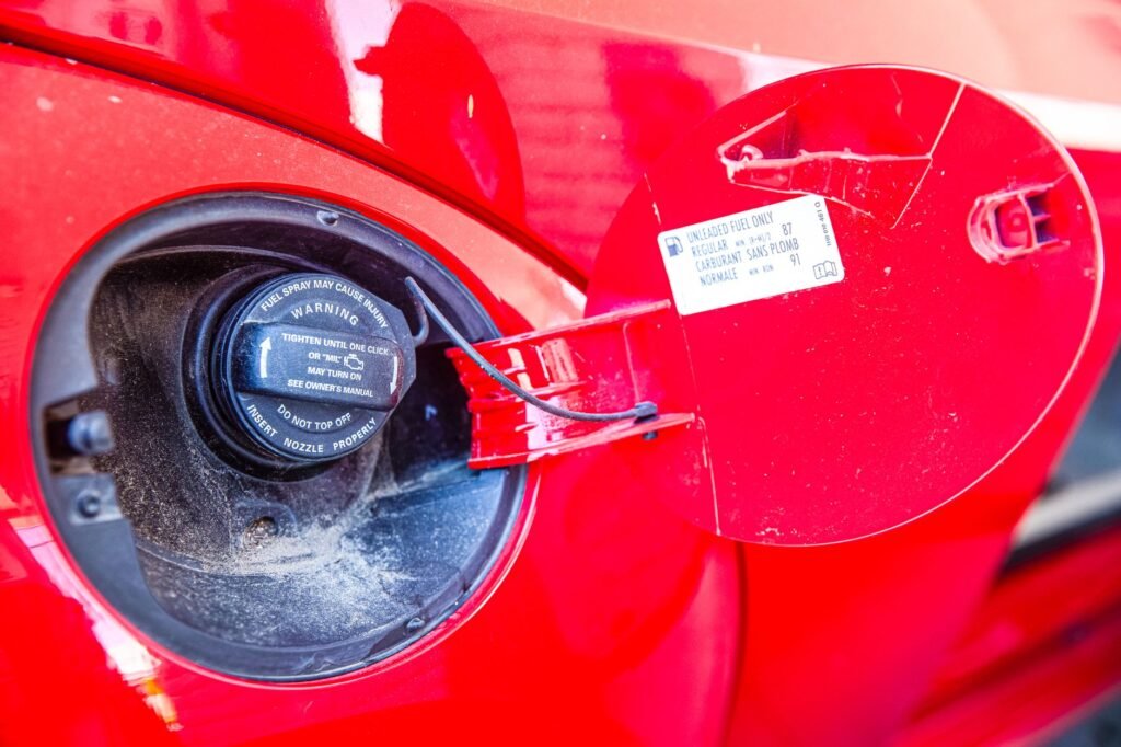 AdBlue in diesel tank: fuel filler cap on a diesel vehicle at a forecourt