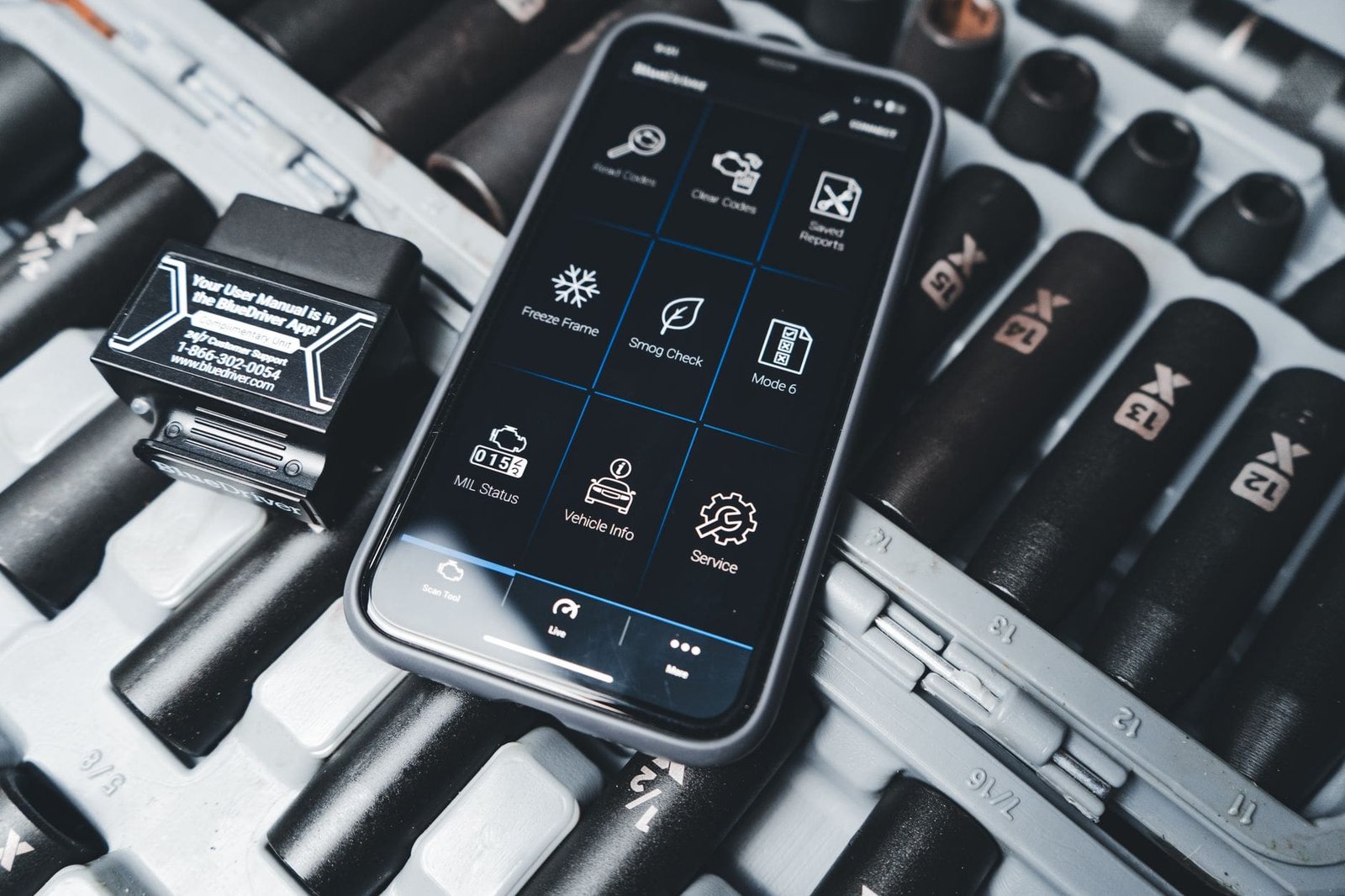Mobile mechanic running live-data diagnostic scan on diesel vehicle for P229F fault